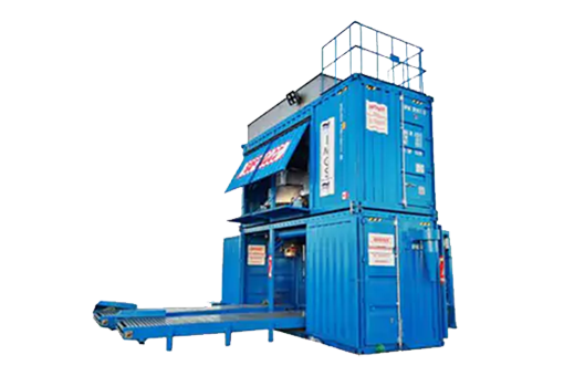 Rapidpack containerized mobile bagging machine (IBC Series) inside an ISO-style container with integrated conveyors, weighing units, and bagging ports, set up in an industrial environment.