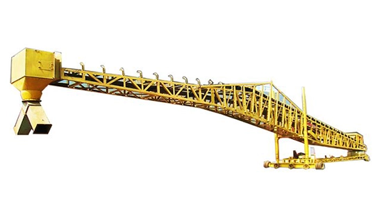 Rapidpack shiploader alongside loader vehicle, operating at high-speed bulk loading port environment