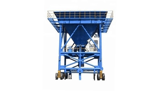 Rapidpack bulk hopper unit with loading conveyor and truck underneath, ready for discharge.